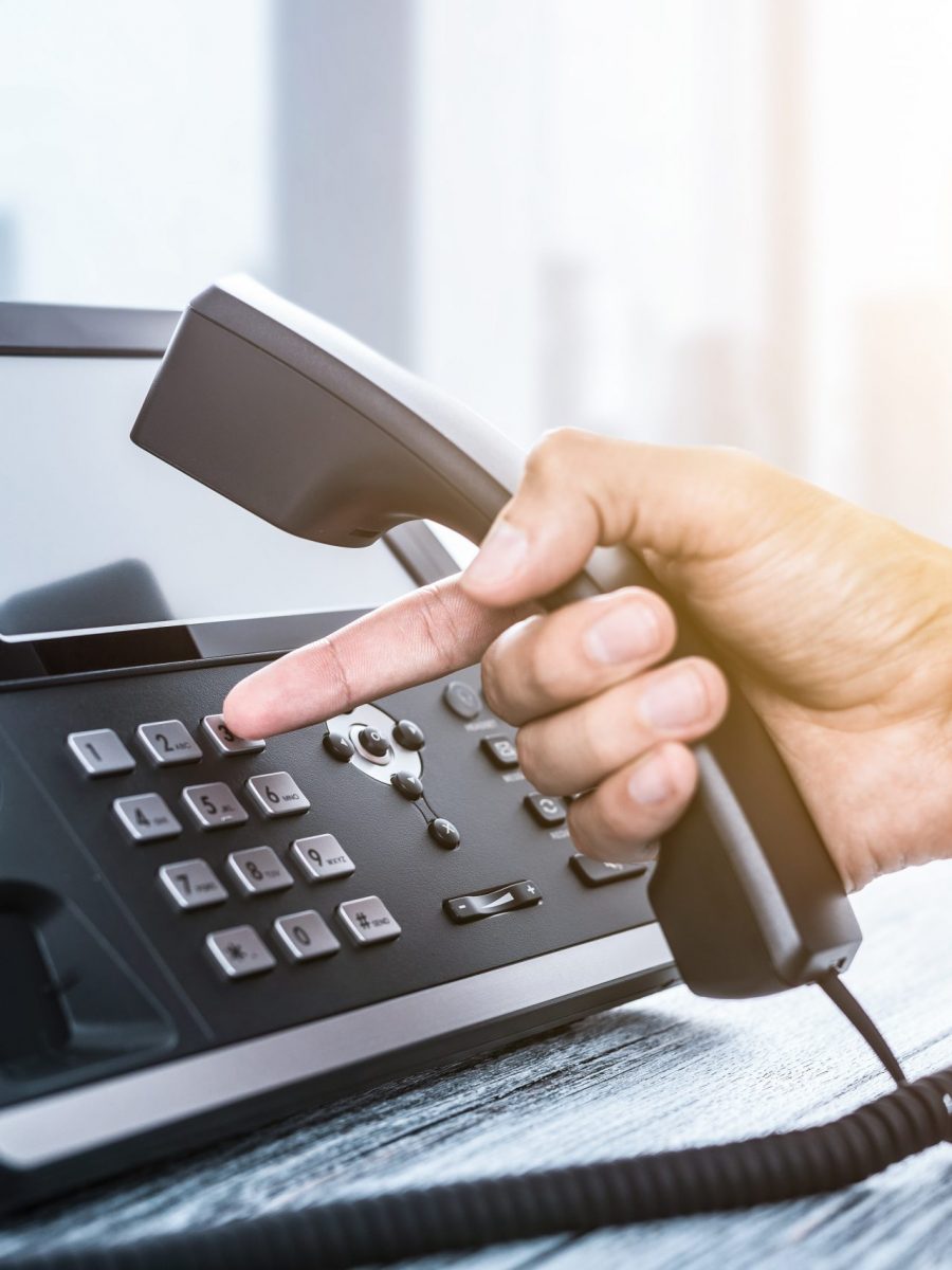 Communication support, call center and customer service help desk. Using a telephone keypad.